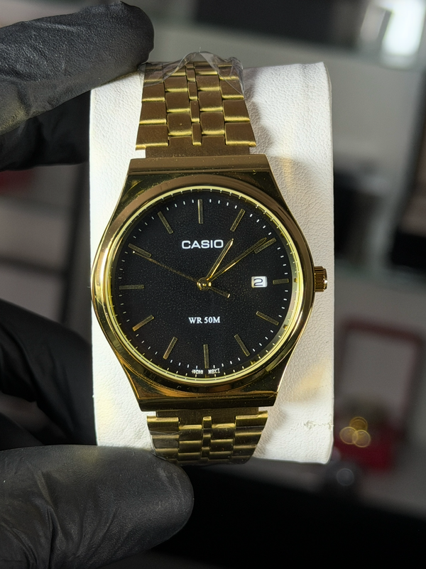 CASIO DORADO